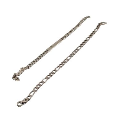 a close up of a silver chain on a white background