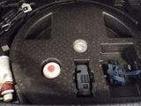 an image of a car ' s engine compartment with a remote control