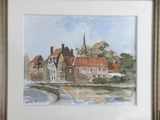 framed watercolor painting of a village with a church in the background