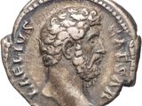 une pièce d'argent portant une tête d'homme
