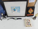 a picture of a picture of a man with a watch and other items