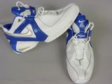 two pairs of white and blue sneakers with white laces on them