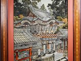 framed picture of a painting of a japanese temple in a wood frame