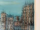 a picture of a picture of a city on the wall