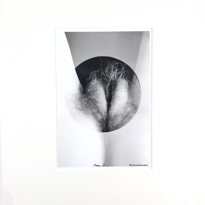 black and white photograph of a woman ' s butt in a black and white photo