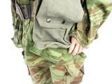 a man in a military uniform holding a bag