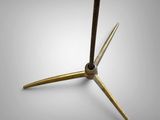 an image of a close up of a clock on a white surface