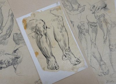 several drawings of a man ' s legs and feet are shown on a table