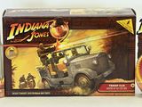 three indiana jones action figures are shown in a display case