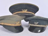 three hats that are sitting on top of each other on a table