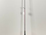 a close up of a fishing rod on a stand in a room