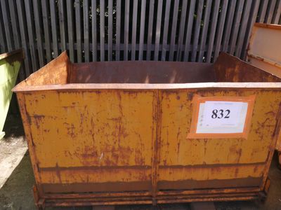 a yellow dumpster with a price tag on it