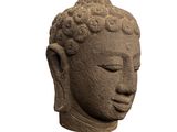 statue of a head of a buddha on a white background