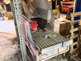 a machine that is sitting on a pallet in a warehouse