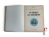 an open book with a picture of a ship on it