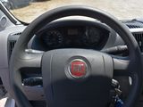 dashboard of a car with a steering wheel and dashboard gauges