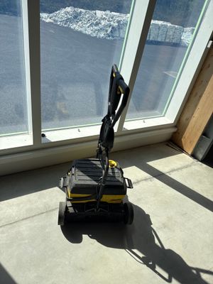 a robot that is sitting in front of a window