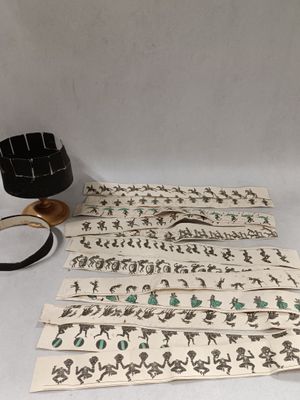 a black belt and a pair of scissors on a table