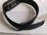 a smart watch that is sitting on top of a box