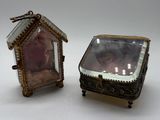a small glass box with a picture inside of it