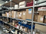 many boxes and containers on the shelves in the warehouse
