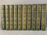 un ensemble de sept livres anciens ornés de lettres dorées
