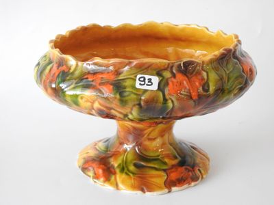 a vase that has a price tag on it