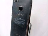 an image of a close up of a cell phone on a stand