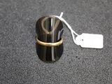 a ring that is sitting on top of a cup