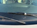 a car that has a windshield wiper on it