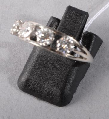 a picture of a ring with three diamonds on it