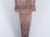 an image of a wooden knife with a star design on it