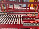 a picture of a machine that is working on a conveyor belt