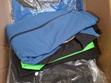 a cardboard box filled with clothes and other items