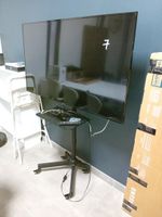 1 téléviseur SAMSUNG 139 cm 1 télécommande, 1 support à roul…