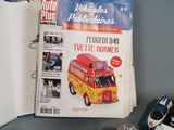 a book with a picture of a bus and cars on it