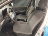 the interior of a car with the front seats down and the steering wheel down