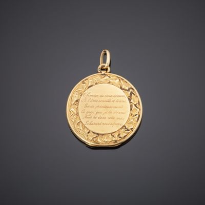 a gold locke with a poem written on it