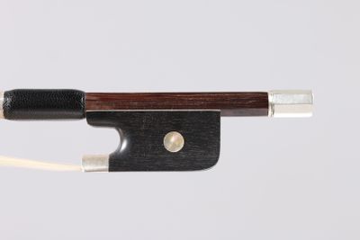 the bow is made of wood and has a black handle
