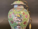 an image of a colorful vase with a light on top of it