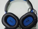 a pair of headphones sitting on top of a table