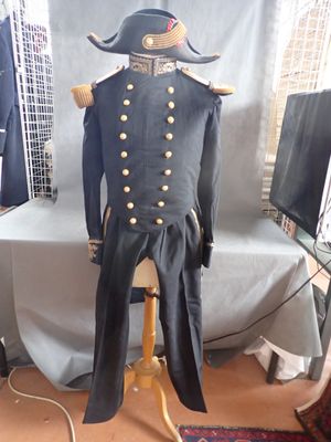 a mannequin dressed in a military uniform on a stand