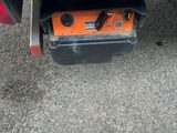 a small tool box underneath the back of a truck