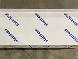 a close up of a white box with blue writing on it