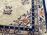 a close up of a rug with flowers on it