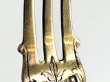 a fork that has a design on it