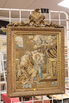 a picture of a painting hanging on a wall
