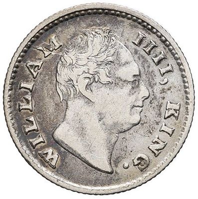 a silver coin with a portrait of a man on it