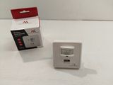 a white box with a red light on it next to a white box with a red light on it