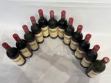 many bottles of wine lined up in a circle